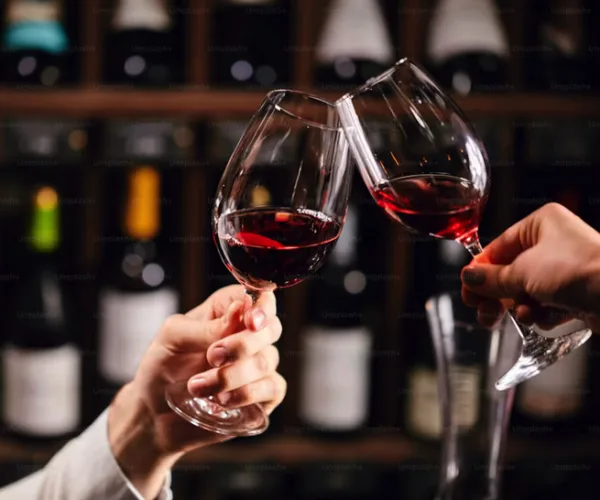 Wine glasses clinking for Wednesday wine specials